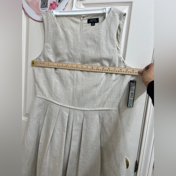 Chic Sleeveless Cream Dress with Lace Hem - Picture 10 of 11